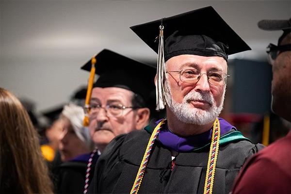 Snapshot of school employees at graduation 